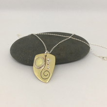 Load image into Gallery viewer, Brass pendant with Serpentine stone and sterling silver, sterling silver chain