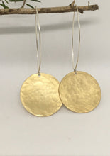 Load image into Gallery viewer, Hammered brass disk large, with sterling silver ear stem, long drop
